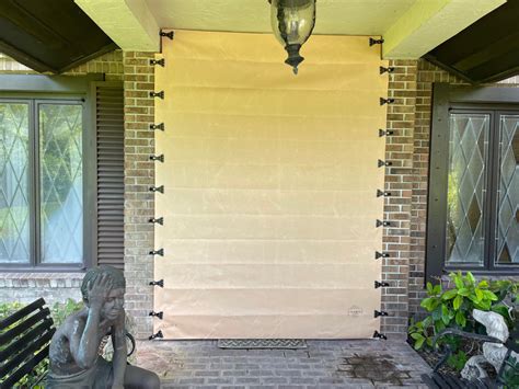 hurricane metal shutters vs fabric shield|fabric hurricane shutters exterior.